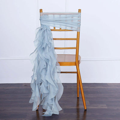 Light blue ruffled chair sash draped over a gold chiavari chair