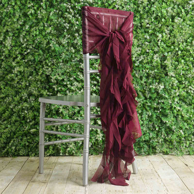 Burgundy chair sash draped elegantly on a silver chiavari chair.