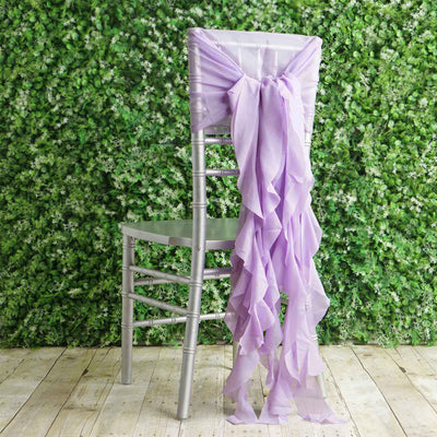 Silver chiavari chair with lavender chair sash against a greenery backdrop.