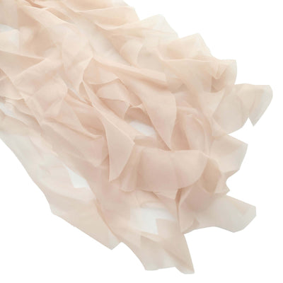 Soft beige chiffon fabric with delicate ruffles for crafting and fashion design.
