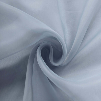 Light blue sheer fabric draped in a swirling pattern.