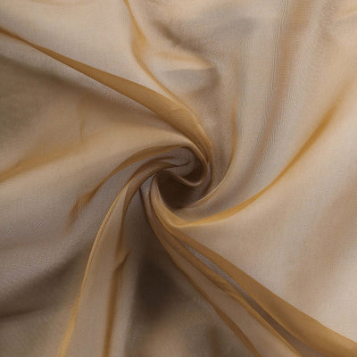 Soft gold fabric swirl, ideal for crafting and fashion projects.