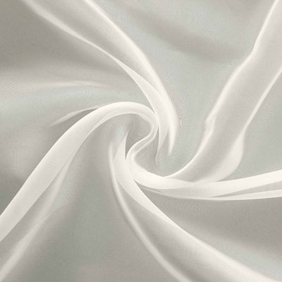 Sheer white fabric in a swirling pattern