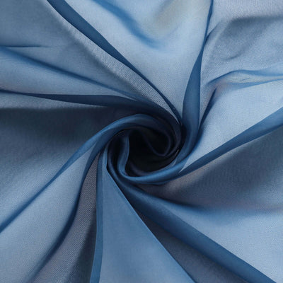 Blue sheer fabric swirled in a spiral pattern.