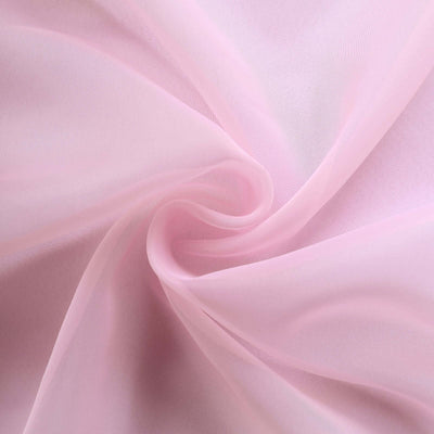 Light pink sheer fabric showcasing soft texture and flow.