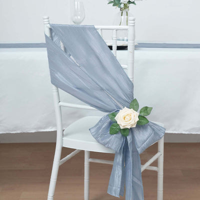 Elegant blue chair sash with a rose and leaves, perfect for events or weddings.