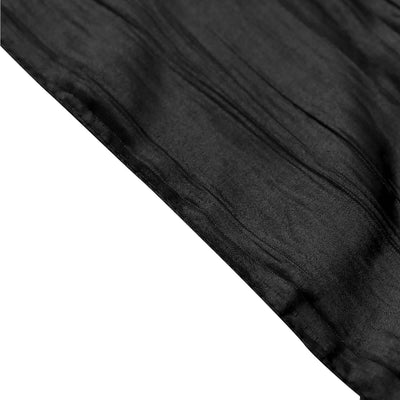 Black sheer fabric with subtle texture on a white background