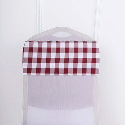 Chair cover with red and white checkered design on a transparent backdrop