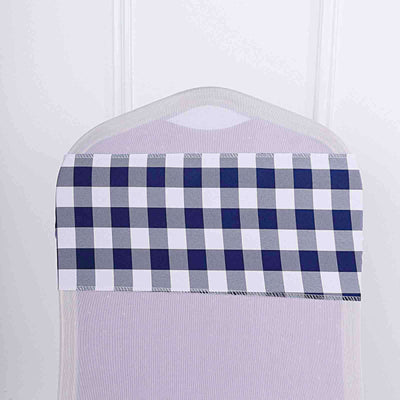 Navy and white checkered chair cover on a plain backdrop