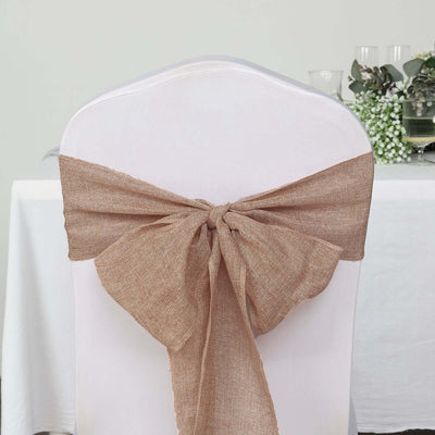 Burlap chair sash tied in a bow for event decor.