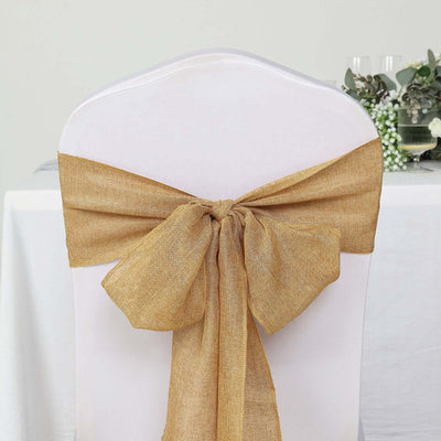 Gold burlap chair sash bow on a wedding chair.