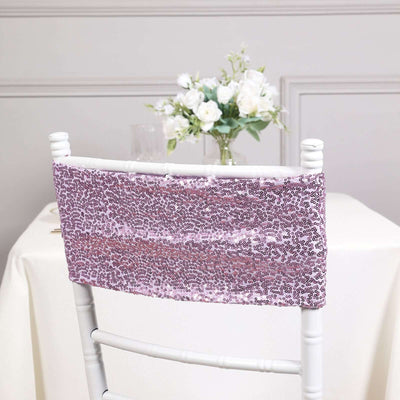 Lavender sequin chair sash draped on a white chiavari chair.