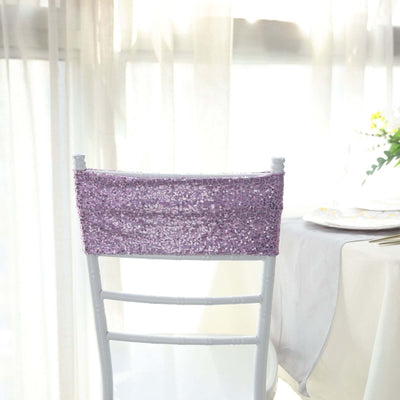 Purple sequin chair cover for events and celebrations.