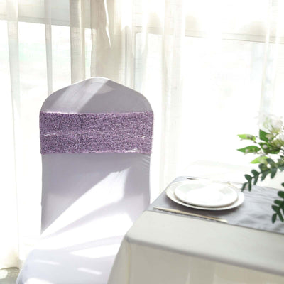 Elegant white chair cover with purple sash, perfect for events.