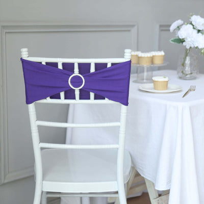 Purple chair sash with rhinestone detail on a white chair.