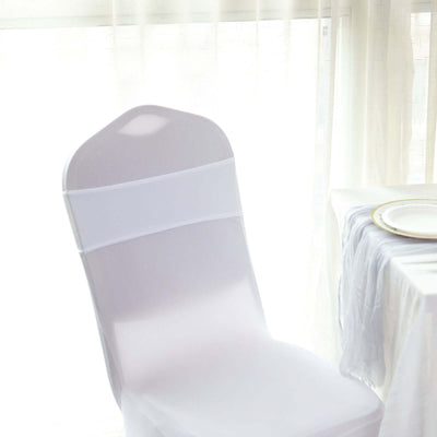 White chair cover draped elegantly over a chair in a bright setting.
