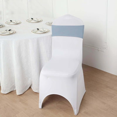 White chair cover with gray band, styled for an elegant dining setup.