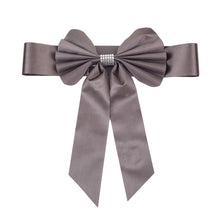 Charcoal Gray Satin & Faux Leather Bow with Rhinestones on a White Background