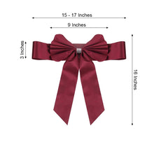 A burgundy satin & faux leather bow with measurements of 15-17 inches and 3 inches