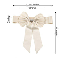 A satin & faux leather ivory bow with measurements of 15-17 inches and 16 inches