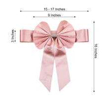 A stylish satin & faux leather mauve | dusty rose bow with measurements of 15-17 inches and 3 inches