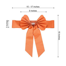 Stylish orange satin & faux leather bow with measurements of 15-17 inches and 3 inches
