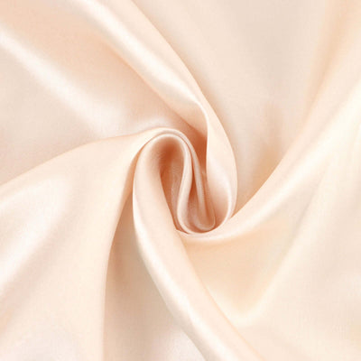 Peach satin fabric with smooth, flowing texture.