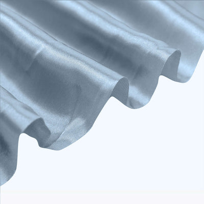 Textured blue fabric with elegant draping detail.
