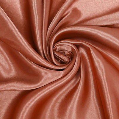 Satin fabric in a rich copper color, showcasing smooth texture and shine.