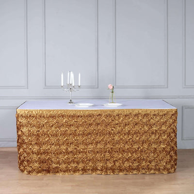 Gold rose patterned tablecloth draped over a table in an elegant setting.