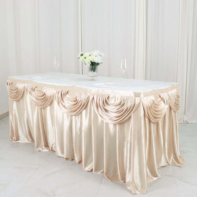 Elegant beige tablecloth with draped design for events and celebrations.