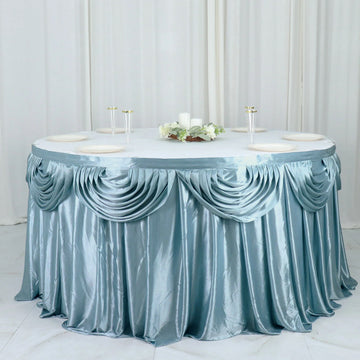 Create a Mesmerizing Atmosphere with the Dusty Blue Pleated Satin Double Drape Table Skirt