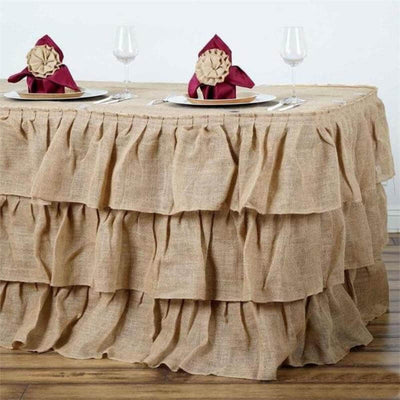 Burlap table skirt with ruffles for rustic decor and event styling.