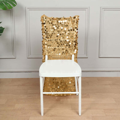 Gold sequin chair cover on a white chair in a stylish interior setting.
