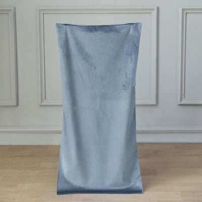 Soft blue fabric draped elegantly in a minimalist setting.