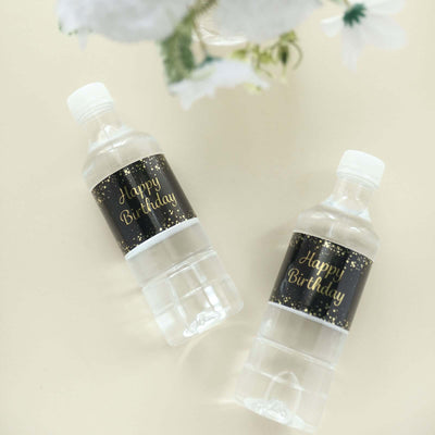Birthday-themed water bottles with festive labels.