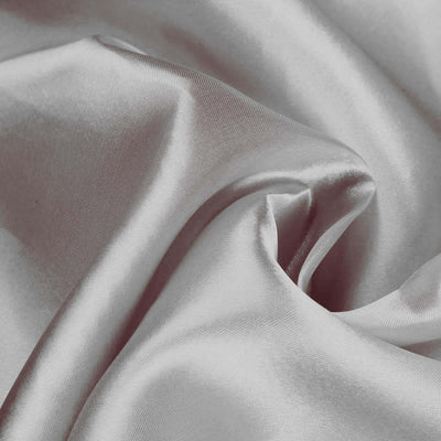 Silky white fabric with smooth texture and elegant draping.