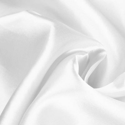 Smooth white satin fabric draped elegantly.