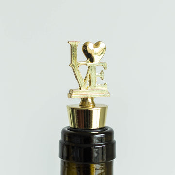Elevate Your Event Decor with a Gold Metal Love Wine Bottle Stopper