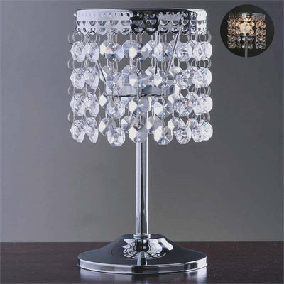 Crystal table lamp with elegant beaded shade and chrome base.