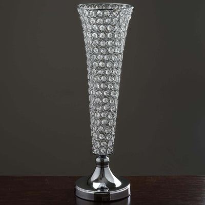 Crystal vase with a sleek chrome base and elegant design.