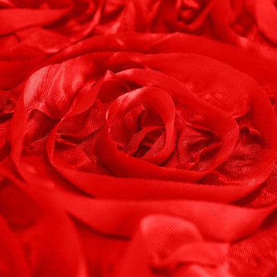 Red satin rose petals arranged elegantly for decoration or gifting.