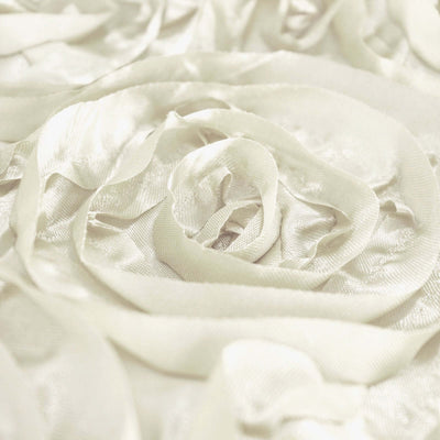 Close-up of elegant satin fabric with rose design in soft cream color.