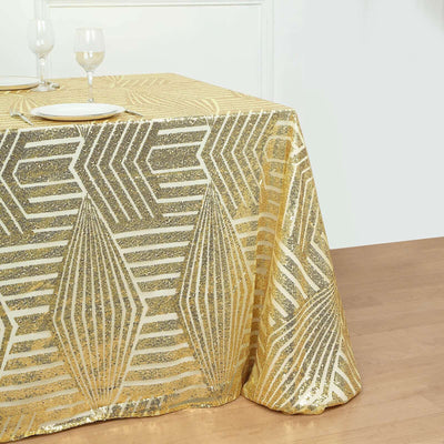 Gold sequined tablecloth with geometric patterns on a wooden table.