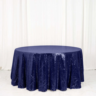 Navy blue sequin tablecloth draped over a round table