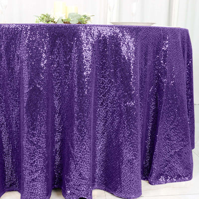 Purple sequin tablecloth draping elegantly over a table.