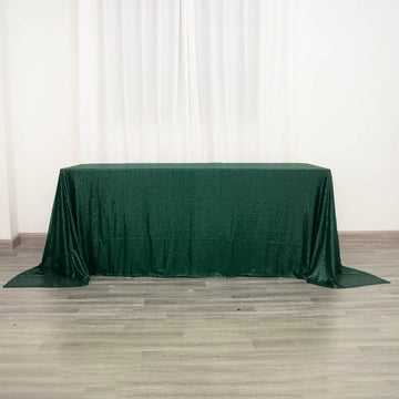 Add a Touch of Elegance with the Hunter Emerald Green Seamless Premium Sequin Rectangle Tablecloth 90"x132"