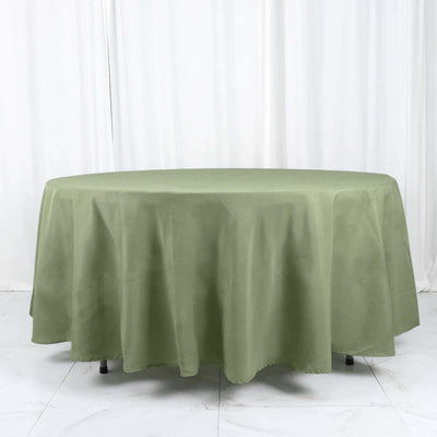 Olive green round tablecloth draped elegantly on a table