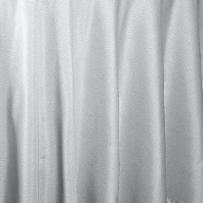 Smooth white satin fabric drape, ideal for elegant decor or fashion design.