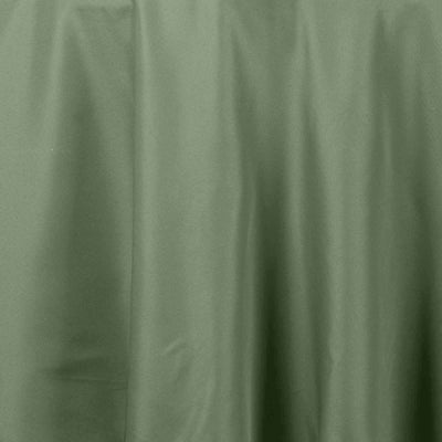Green fabric texture with soft draping folds.